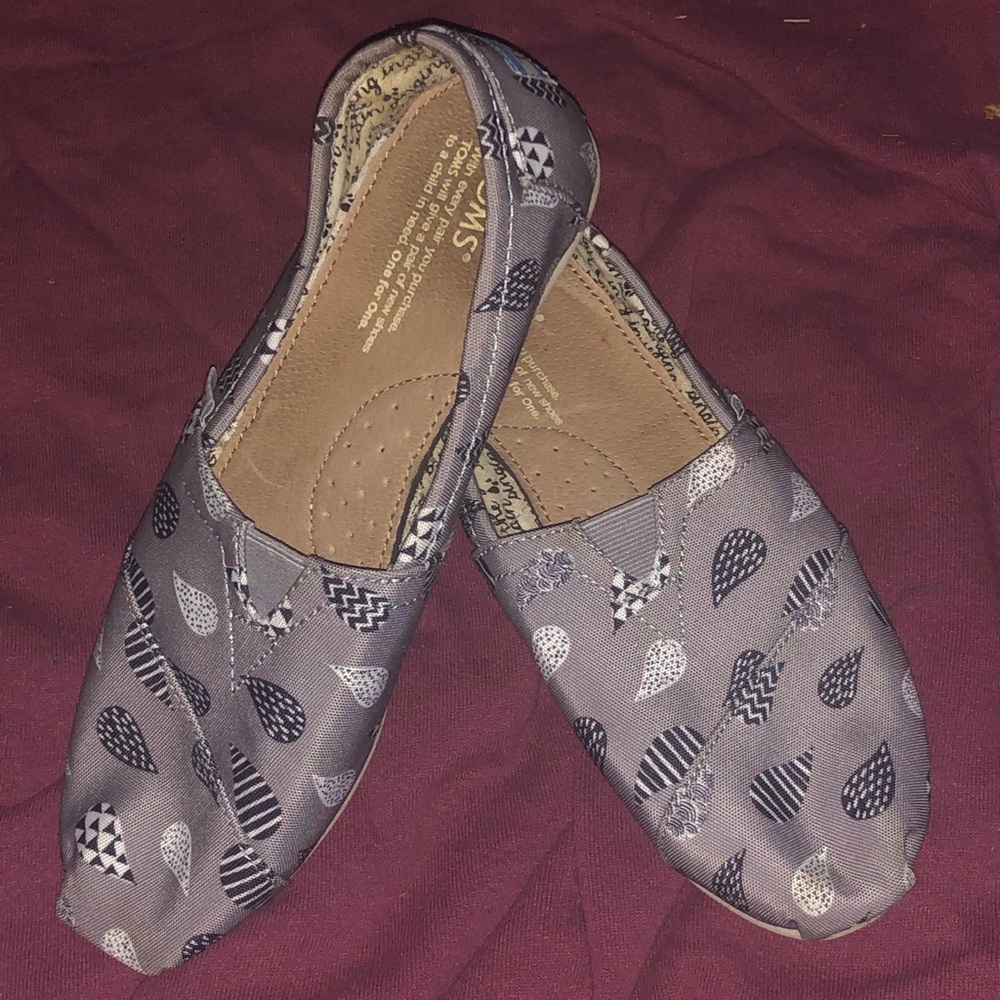 Toms,  “Singing in the Rain” slip on canvas shoes.